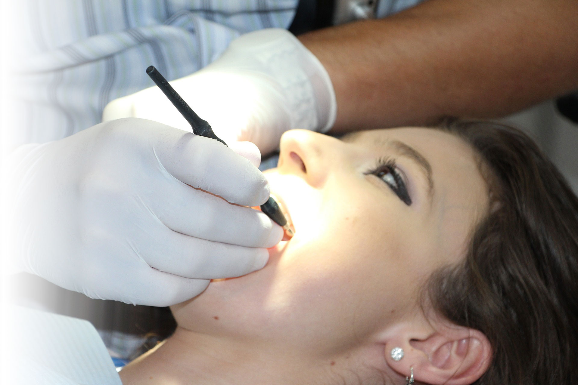 Image of a women undergoing a root canal.